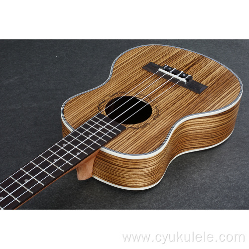 Zebra wood ukulele lettering